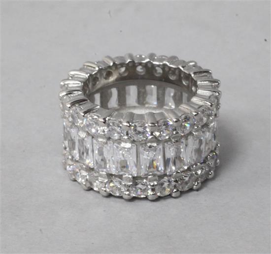 A paste set triple row eternity ring, size J.